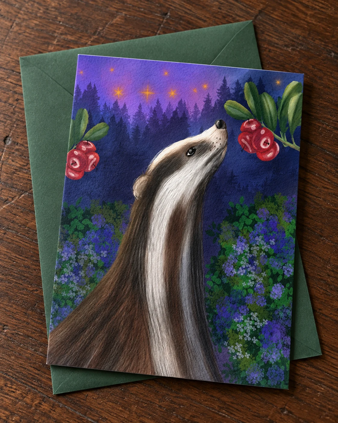 Under the Rowan borderless 5 × 7 inch greeting card on a green envelope on an oak desk
